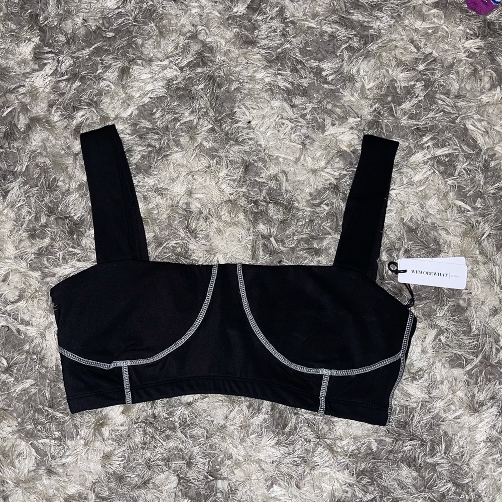 Never worn with tags WEWOREWHAT active wear corset top in black